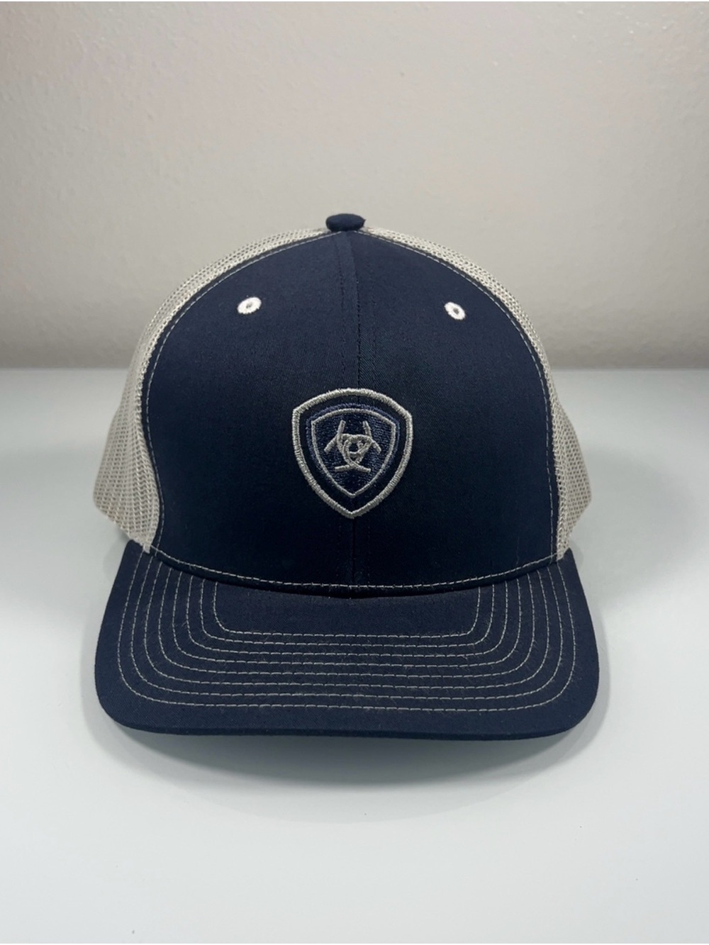 Ariat Men's Trucker Hat Navy Blue Tan Mesh Snapback Cap Embroidered Shield NWOT